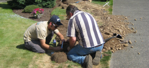 the Grand Prairie Sprinkler Repair team installs a new underground line